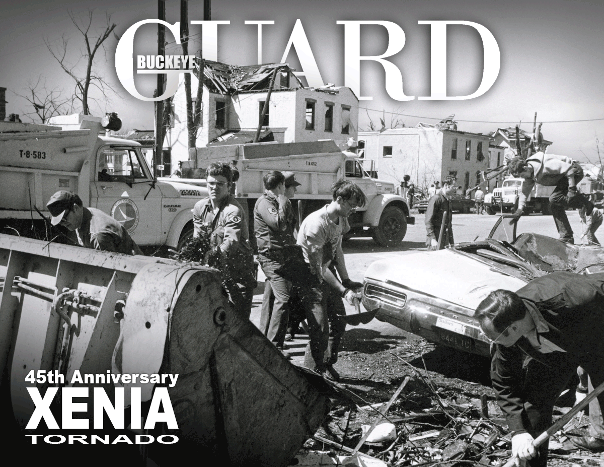 Black and white photo of Guard members cleaning up damage from 1974 tornado in Xenia.
