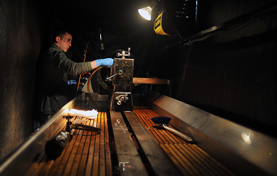 Staff Sgt. Richard Leu, a nondestructive inspection technician, prepares a function check on a magnetic particle machine