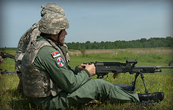 Capt. Branko Stinkoyich, a member of the Serbian Armed Forces, fires a .50-caliber Browning machine gun