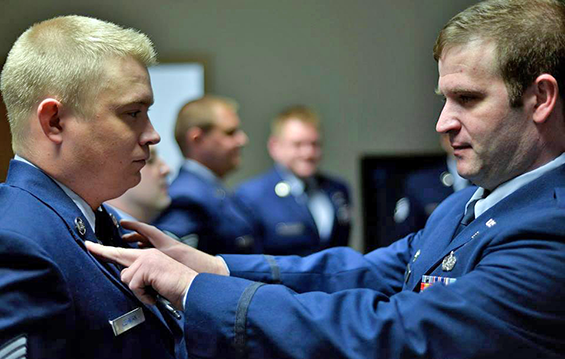 First Lt. Clinton Hensley (right) inspects Staff Sgt. Christopher Lehman during a "blues" inspection.