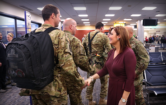 Ohio Lt. Gov. Mary Taylor (right) greets members of the Ohio Army National Guard’s 1st Battalion, 137th Aviation Regiment as they return home from deployment.