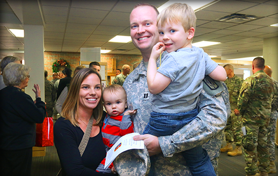 Soldiers of Headquarters and Headquarters Battery, 174th Air Defense Artillery Brigade reunite with Family members at the unit’s welcome home ceremony.