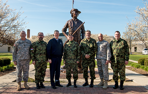 Maj. Gen. Mark E. Bartman (third from left), Ohio adjutant general, and Maj. Gen. John C. Harris Jr. (second from right), Ohio assistant adjutant general for Army, take a photo with chaplains from the Serbian Defense Force 