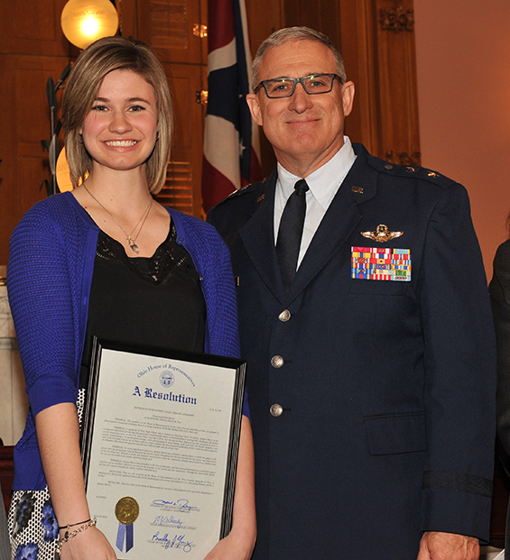Sydney Barrett (left) receives a proclamation on behalf of Gov. John Kasich from Maj. Gen. Stephen E. Markovich, commander, Ohio Air National Guard, recognizing her as the Ohio Military Child of the Year.