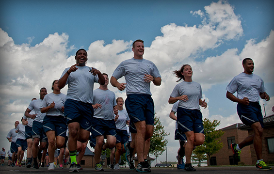 Capt. Evan Howard (right) leads a formation run.