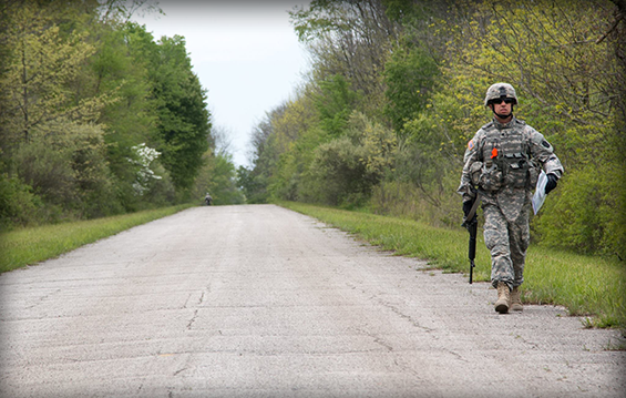 Ohio Army National Guard Spc. Matthew Allen makes his way toward his starting point during the day land navigation course at the 2016 Region IV Best Warrior Competition.