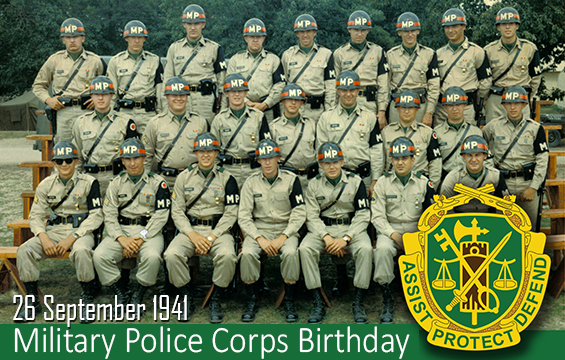 Soldiers of the 37th Military Police Company take a unit photo in 1965 at Camp Grayling, Mich.