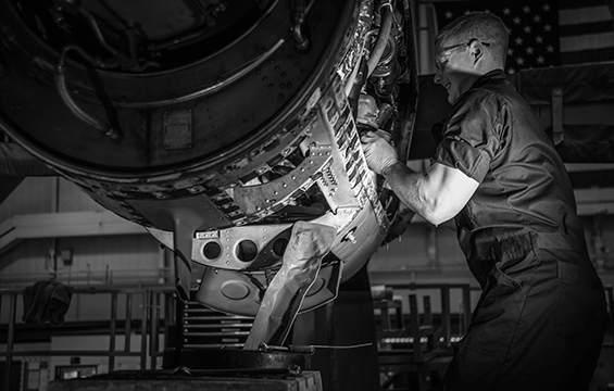Senior Airman Zach Yates removes the low pressure fuel filter of a C-130H Hercules engine.