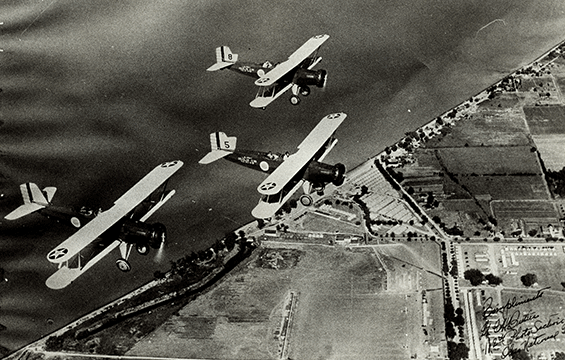 Planes of the 112th Observation Squadron planes fly over Camp Perry, Ohio, circa 1935. 