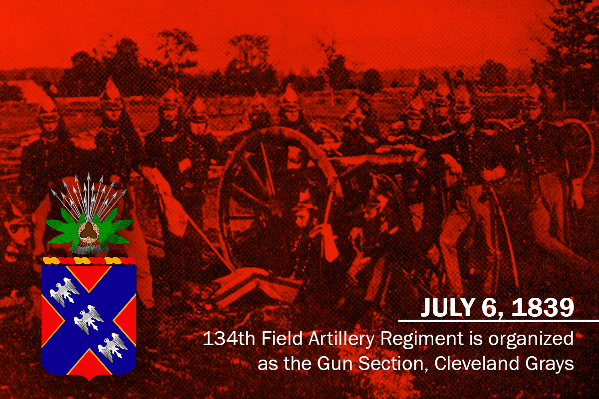 Soldiers stand around canon. Graphic displkays insignia and reads: JULY 6, 1839, 134th Field Artillery Regiment is organized as the Gun Section, Cleveland Grays