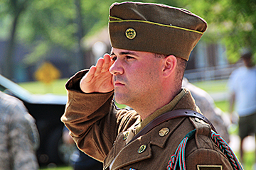 Soldier in vintage uniform salting