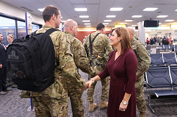 Ohio Lt. Gov. Mary Taylor (right) greets members of the Ohio Army National Guard’s 1st Battalion, 137th Aviation Regiment.