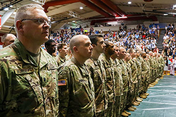 Members of the 371st Sustainment Brigade receive a standing ovation during the unit’s call to duty ceremony.