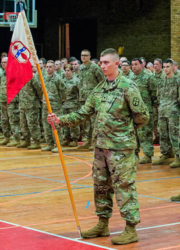 Members of the 371st Sustainment Brigade stand in formation prior to the unit’s call to duty ceremony.