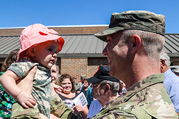 Baby girl reunited with Soldier.