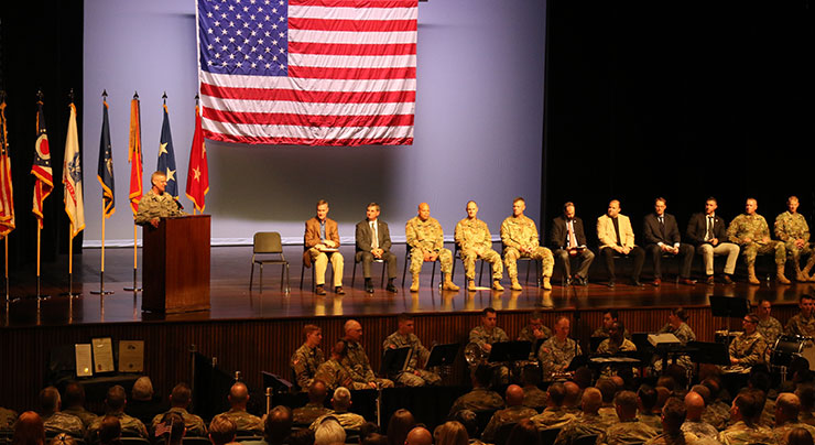 Maj. Gen. Mark E. Bartman stands at podium, Ohio adjutant general, addresses Soldiers at their welcome home ceremony.