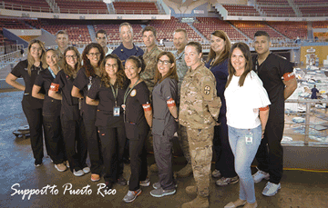 Behavioral health professionals from the Ohio National Guard and U.S. Public Health Service and students from the University of Ponce group photo.