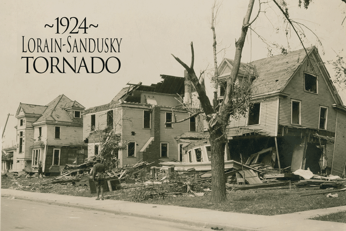 Historic black and white photo of Soldier patrolling street of houses damaged from tornado.
