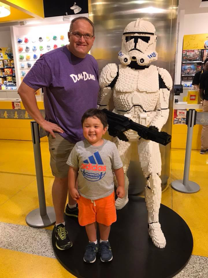 George Davis with son Park with life-size Star Wars Leggos figure.