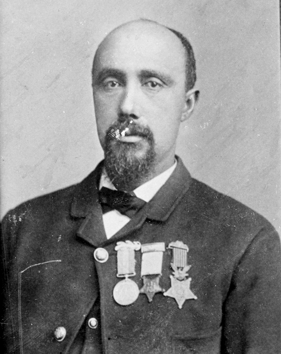 Stow armory with 1st Sgt Robert Pinn super imposed