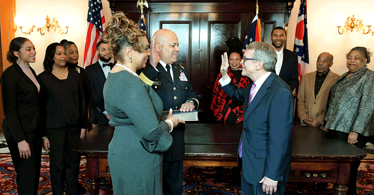 Harris taking oath from governor.