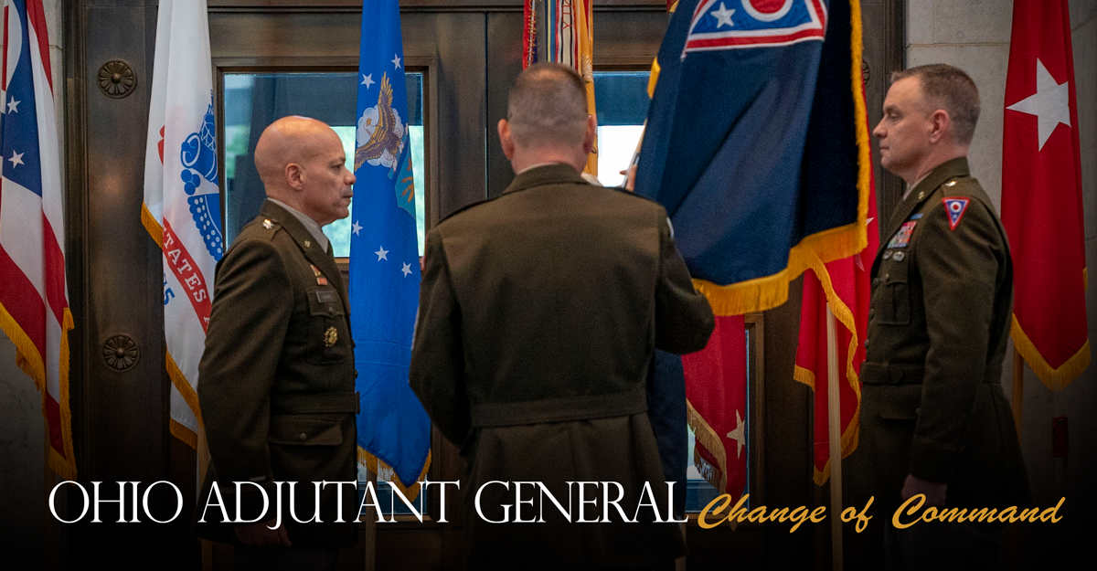 MG John C Harris salutes formation of Soldiers as he walks through from Black Hawk helicopter.