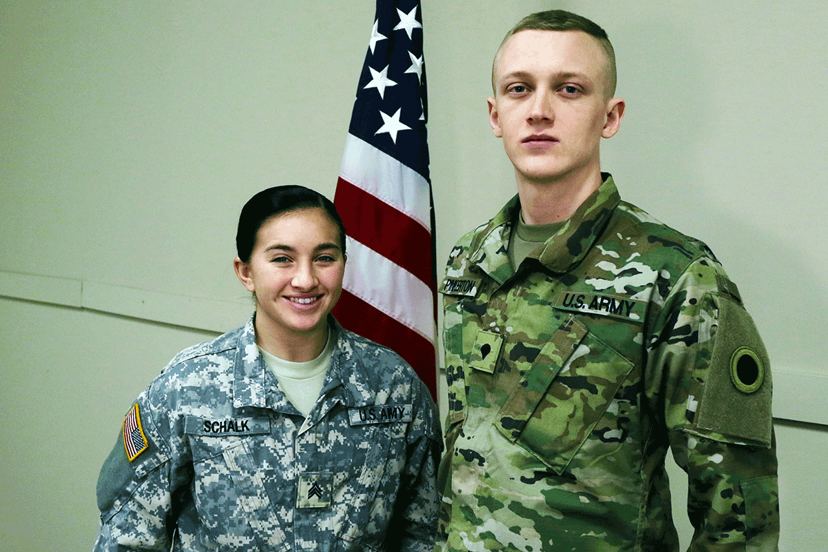 Sgt. Whitney Schalk (NCO of the year) stands with Spc. Adam Pinkerton (Soldier of the year).
