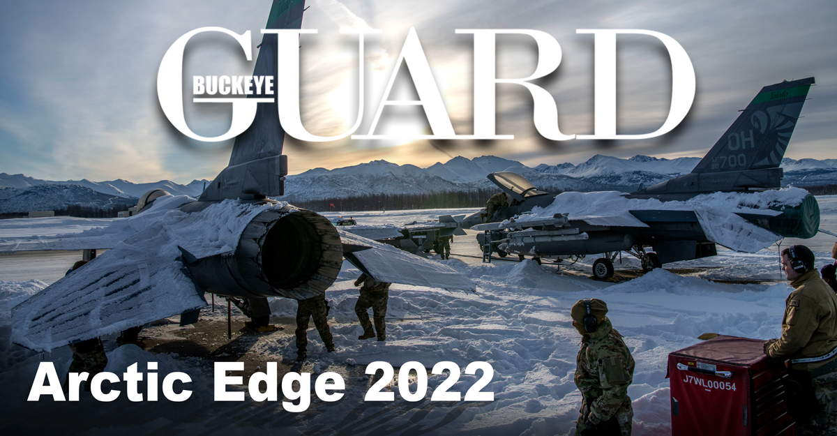 Buckeye Guard cover: F-16 on tarmak with Arctic mountains at sunset.