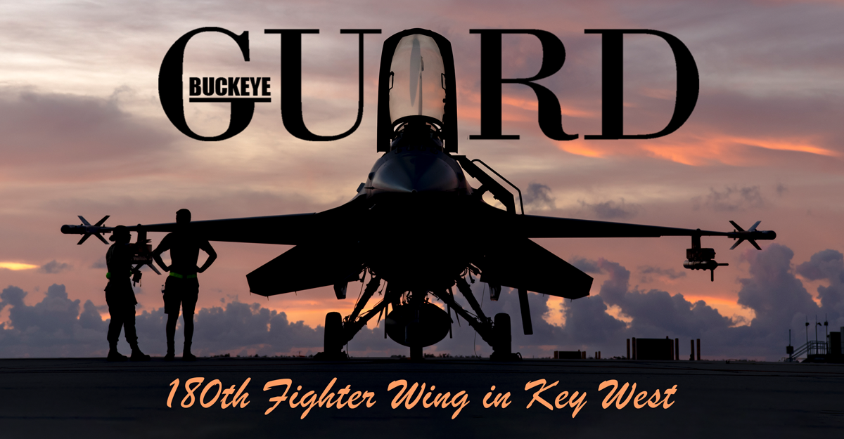 Cover of September/October 2022 Buckeye Guard Online Publication. Airmen guide C-130 on tarmac while fire fighters spray aircraft.