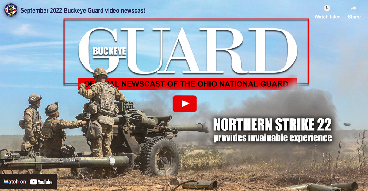 Cover of Buckeye Guard video- C-130 on tarmak with visitors around watching C-130 in the air.