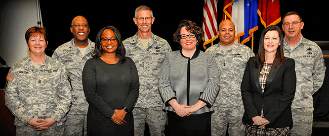 Senior leaders of the Ohio National Guard stand with panel members.
