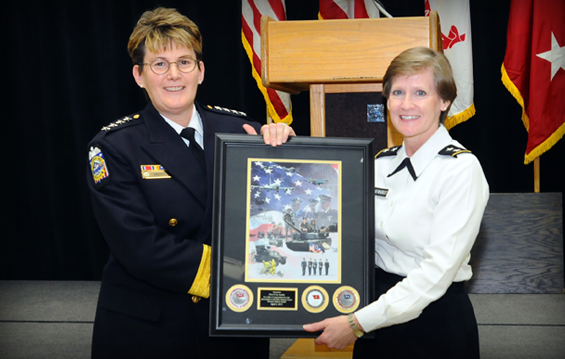 Maj. Gen. Deborah A. Ashenhurst (right), Ohio adjutant general, presents Columbus Police Chief Kim Jacobs with a commemorative Ohio National Guard print 