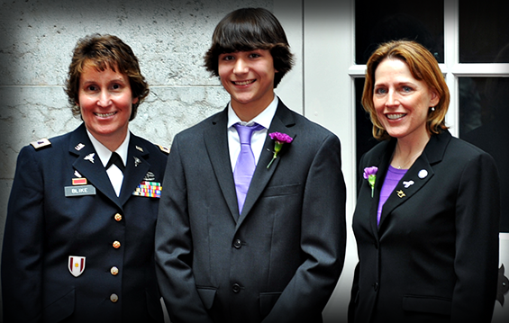 Col. Julie Blike (from left), director of Family Readiness and Warrior Support for the Ohio National Guard, Joel Rieck and state Rep. Connie Pillich, of Ohio's 28th District in the Cincinnati area, pose for a photo April 24, 2013, at the Ohio Statehouse in Columbus, Ohio, to celebrate April as Month of the Military Child. 