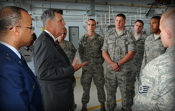 Retired Marine Corps Lt. Gen. Dennis McCarthy (second from left), chairman of the National Commission on the Structure of the Air Force, talks with Airmen of the 121st Air Refueling Wing.