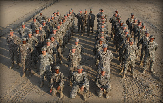Soldiers of the 371st Sustainment Brigade, currently deployed to Camp Arifjan, Kuwait, show their Ohio State University pride by forming a "Block O." 