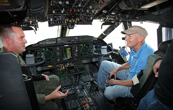 Master Sgt. Michael Keller (left), a loadmaster with the 179th Airlift Wing, speaks with Jack Etheridge, vice president of Organic Technologies and an employer of Ohio National Guard members.
