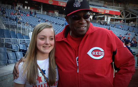 Molly Frey (left), a Pickerington, Ohio, native, stands with Cincinnati Reds manager Dusty Baker 
