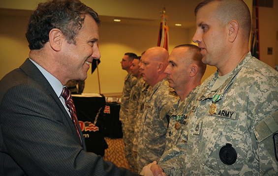 U.S. Sen. Sherrod Brown presents military awards to veteran Ohio National Guard members