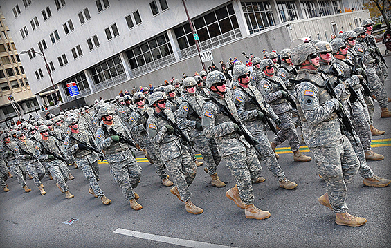 Soldiers of the Ohio Army National Guard's 37th Infantry Brigade Combat Team march in the annual City of Columbus Veterans Day parade 