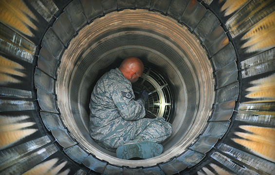 Staff Sgt. Michael Woronec, a crew chief with the 180th Fighter Wing, inspects the exhaust of an F-16 Fighting Falcon.