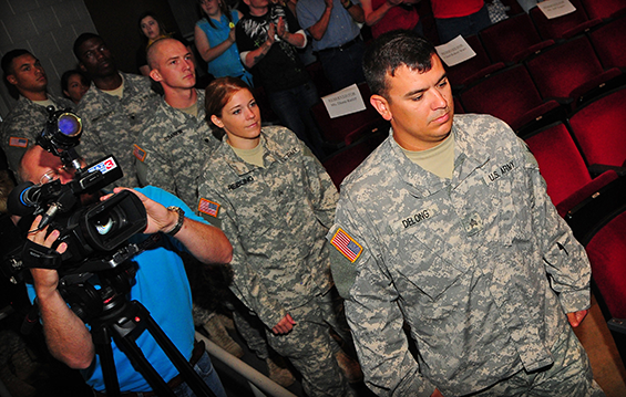 Soldiers of the 1191st Engineer Company enter the auditorium of the Vern Riffe Center for the Arts on the Shawnee State University campus during the unit's call to duty ceremony.