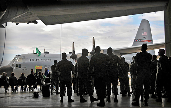 Members of the 179th Airlift Wing gather before the dedication ceremony for one of their C-130H Hercules aircraft