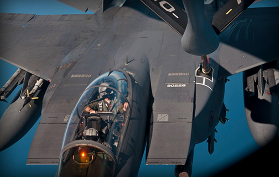 A KC-135R Stratotanker delivers fuel to an F-15E Strike Eagle.