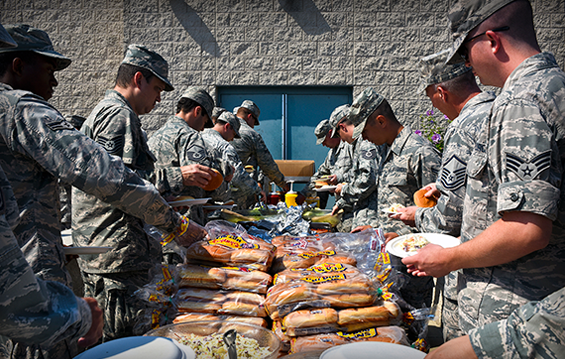Members of the 121st Air Refueling Wing are treated to a "Burger Burn" 