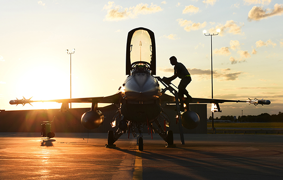 A crew chief assigned to the 180th Fighter Wing prepares an F-16 Fighting Falcon for night flying exercises.