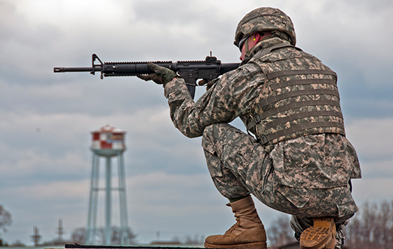 An Ohio National Guard Soldier checks the sight picture on his M16 rifle.