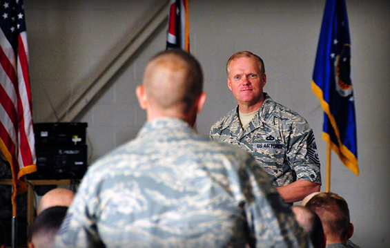 Chief Master Sgt. of the Air Force James A. Cody listens to an Airman's question during an open forum discussion.