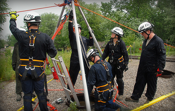 Members of the 178th Fire Emergency Services flight set up a tripod pulley to rescue a victim during the Guardian Shield exercise.