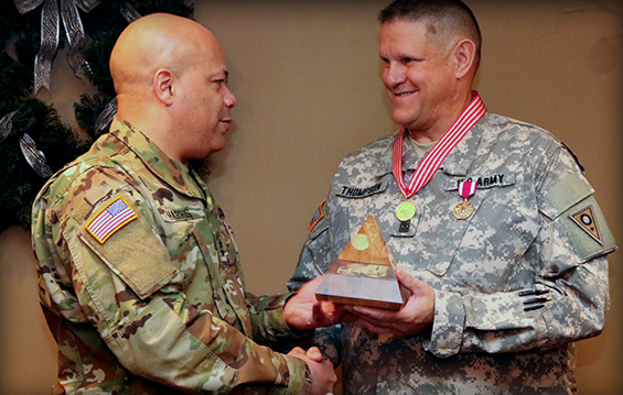 Maj. Gen. John C. Harris Jr. (left), Ohio assistant adjutant general for Army, thanks Sgt. Maj. Garrick Thompson, the human resource sergeant major for the Ohio National Guard, for his many years of dedicated service.