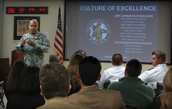 Maj. Gen. John C. Harris Jr. (standing), Ohio assistant adjutant general for Army, presents a briefing on process management and improvement within the Ohio Army National Guard to the Midwest Academy of Management.